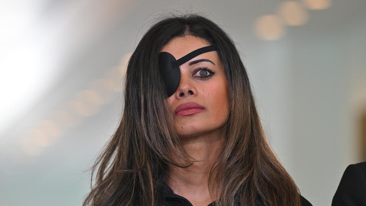 Protest charges dropped against woman 'punched by cop'