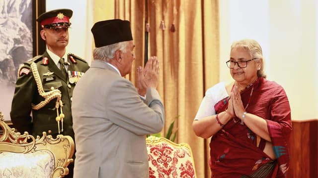 Nepal sets poll date as interim prime minister sworn in