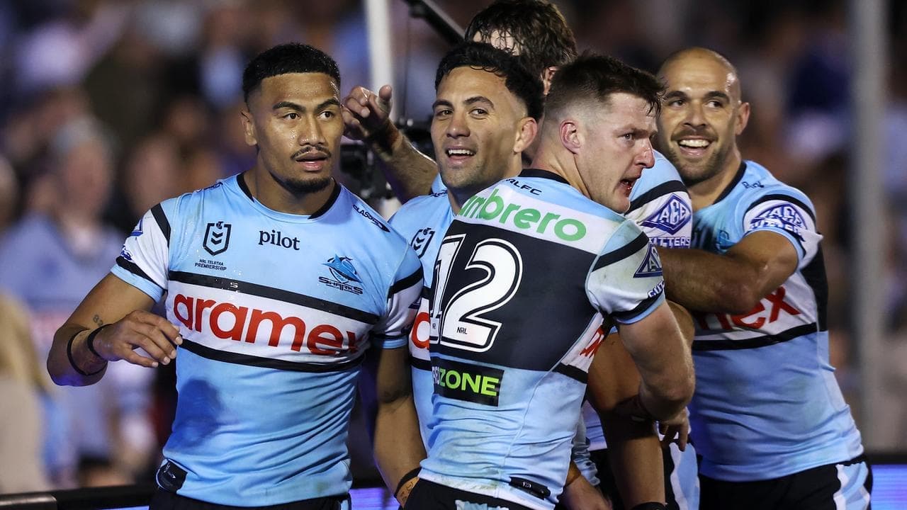 Evolved Sharks hold nerve to eliminate Chooks
