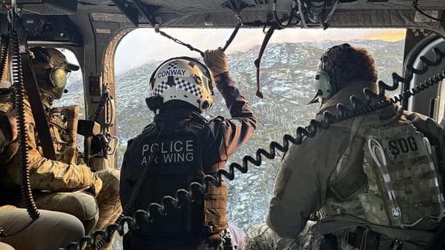 Behind the scenes: major hunt for accused police killer