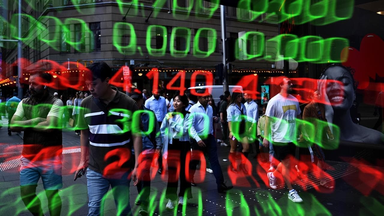 Aussie shares pare early losses but finish lower