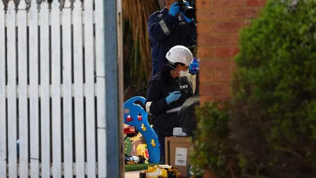 Woman freed on bail over fire that killed two children