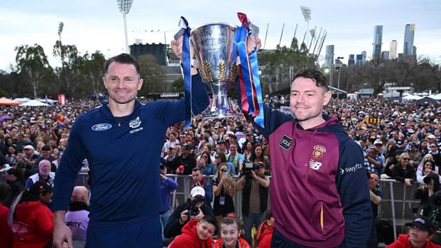 Feline good: Lions and Cats fans turn out to AFL parade