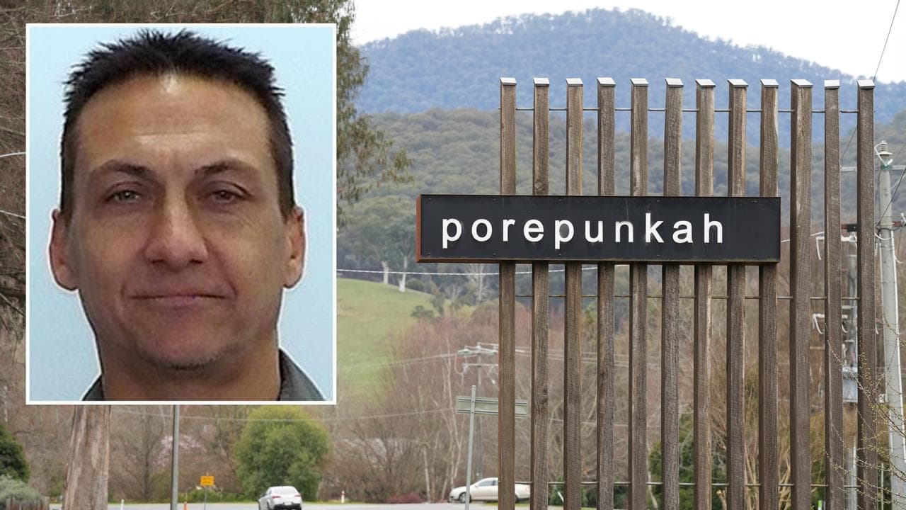 Man cleared of accused killer link as search ramps up