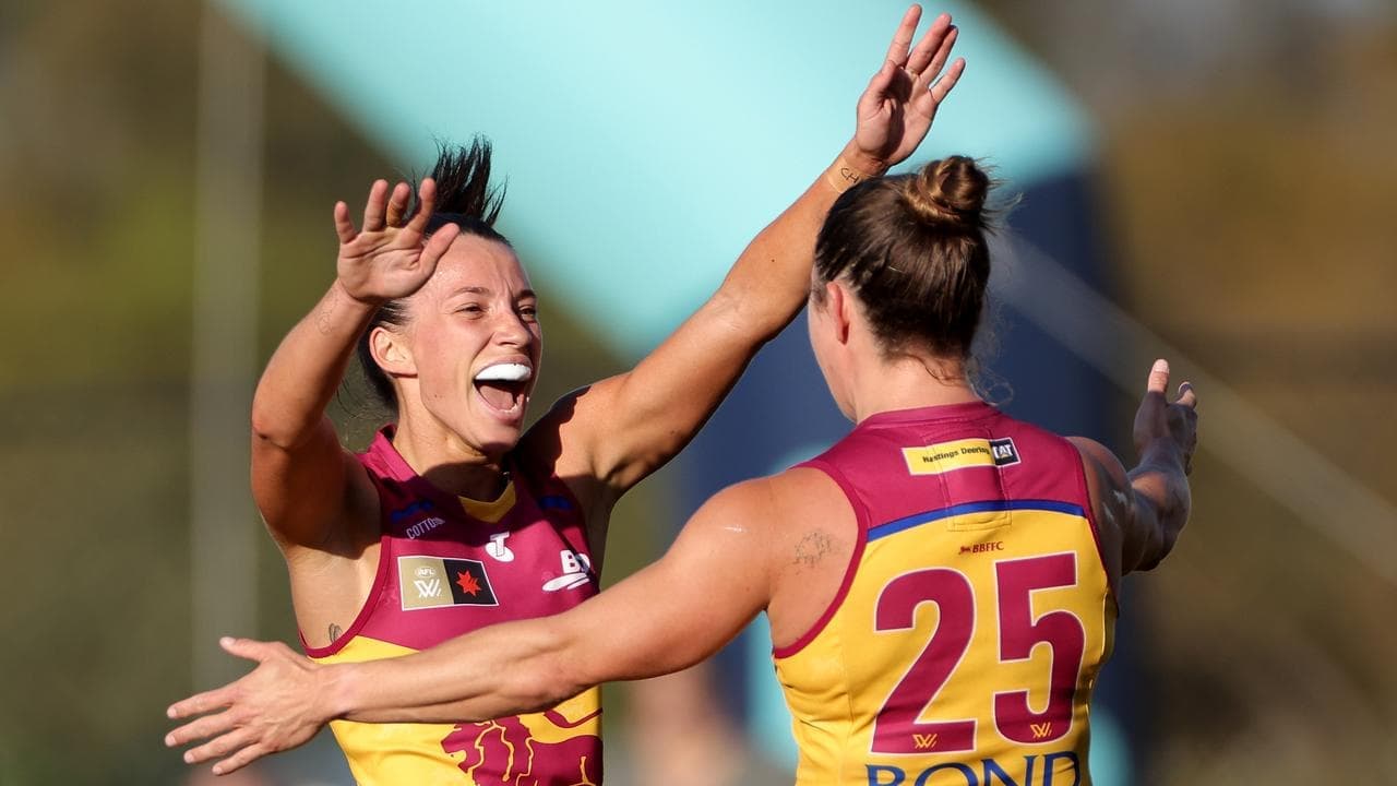 Lions romp to AFLW derby win in coach's 100th game