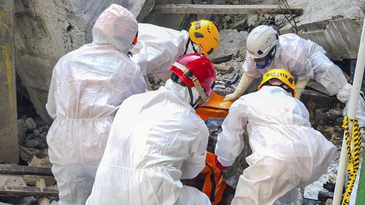 Search continues as Indonesia building toll rises to 49