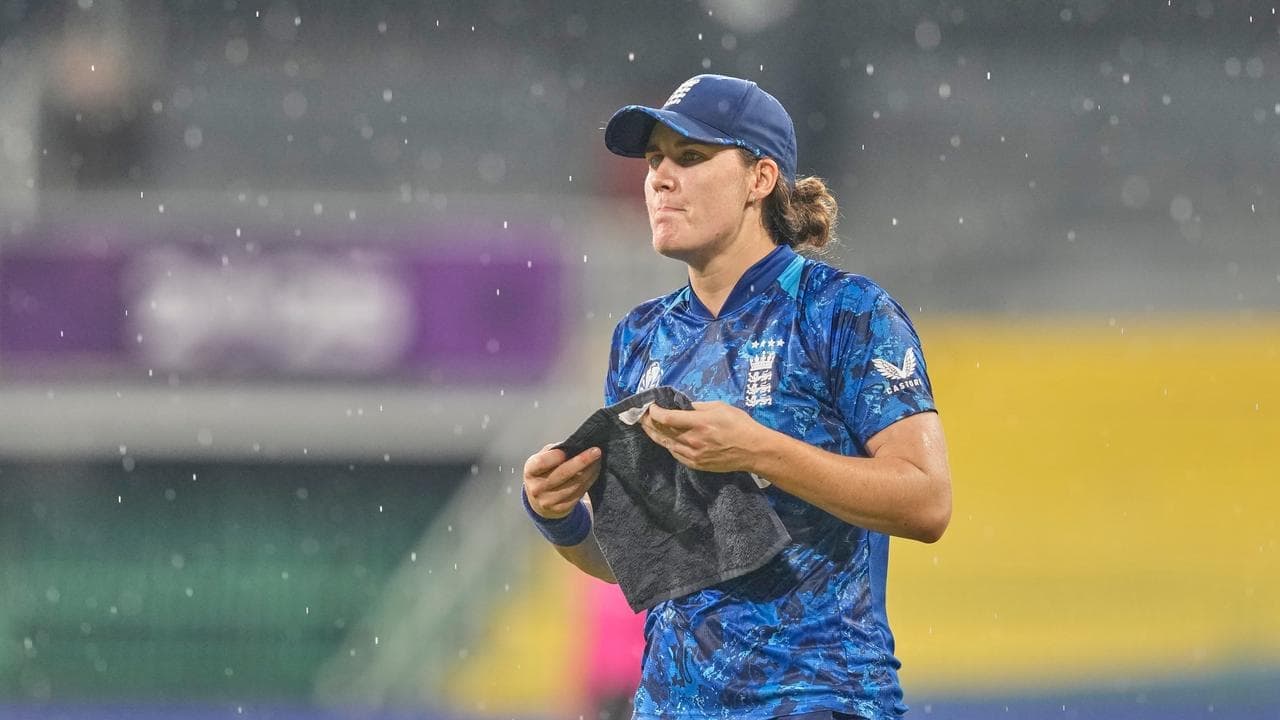 England saved by World Cup rain as Aussies go joint top