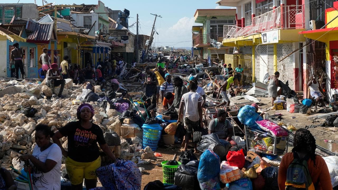 Death toll climbs in Caribbean as hurricane moves north