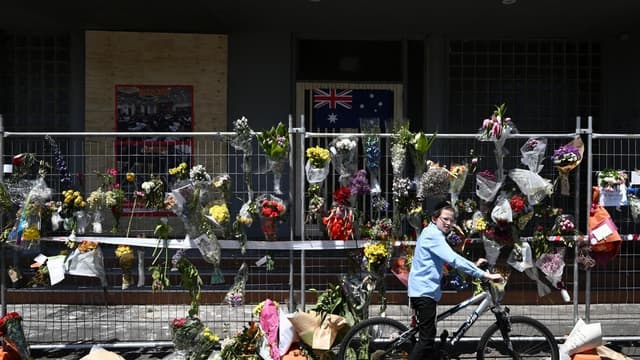 Premier backs down on protester face mask ban