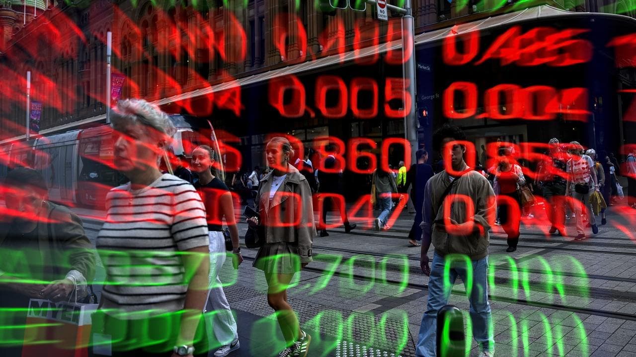 Aussie shares hand back gains as CBA, IT stocks weigh