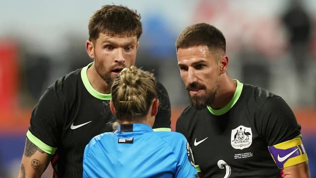 Socceroos rue 'soft penalty', virus after lopsided loss