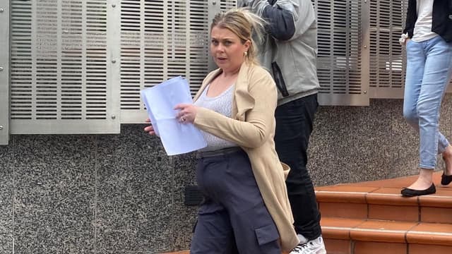 Woman accused of trying to kill police fronts court