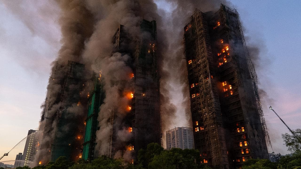 Four dead as fire rages through Hong Kong high-rise