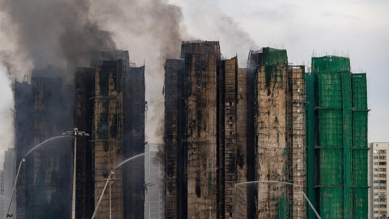 ‘Negligent’ builders blamed for HK blaze that killed 55
