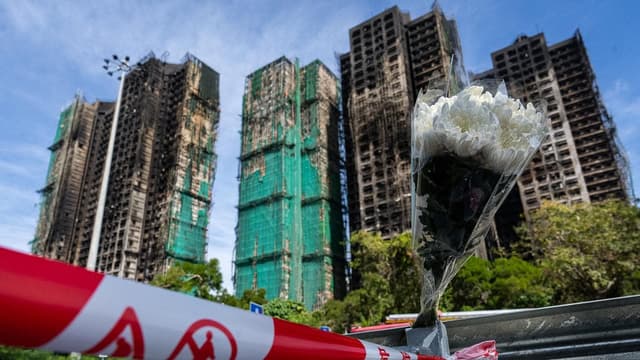 HK fire toll rises to 128, rescuers make final search