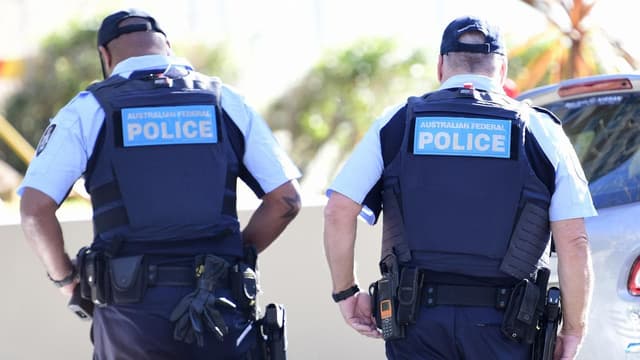 Swastika sword seized as men charged over Nazi symbols