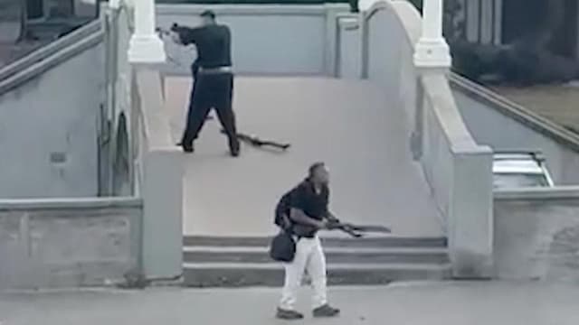 Gunmen linked to Islamic State as flags, bombs found