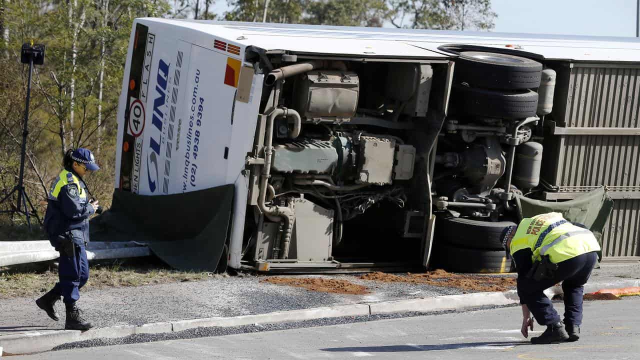 Driver charged over 10 deaths in wedding bus tragedy