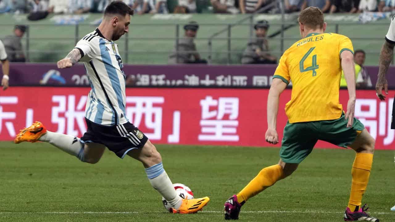 Messi inspires Argentina past Socceroos in Beijing