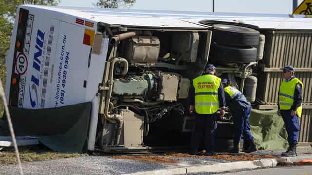 First memorial for bus victim as new safety probe opens