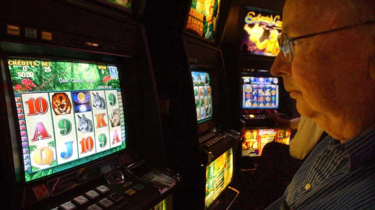 NSW cuts pokie numbers, cash feed-in limits