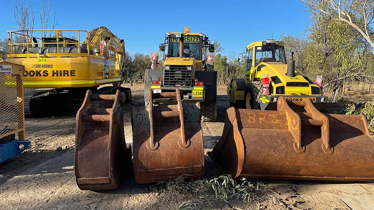 Woman protests as fracking rig heads for Beetaloo Basin