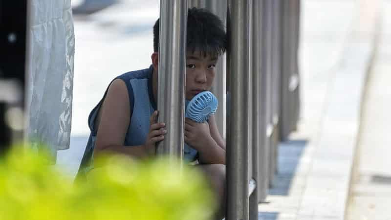 Heatwave grips China as flood toll rises in South Korea