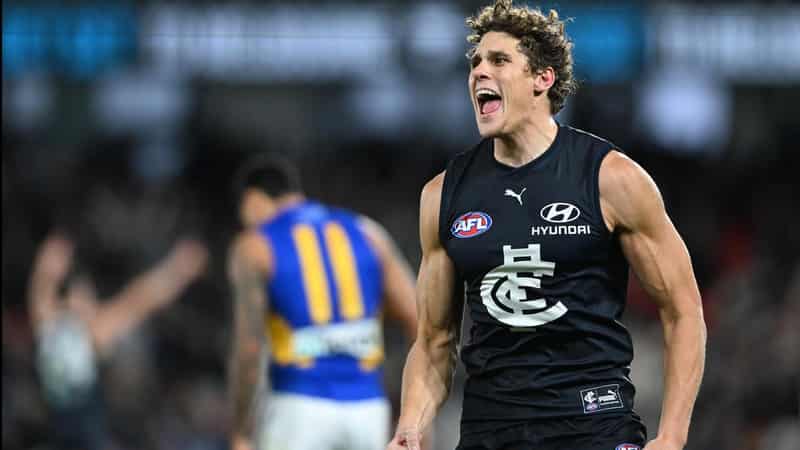 Injuries sour Blues' AFL win as Curnow kicks 10 goals