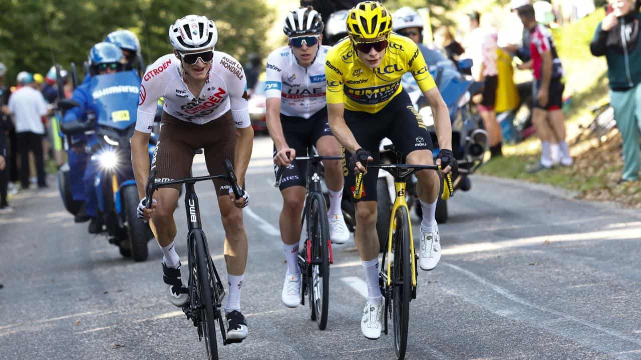 Vingegaard seals Tour de France as Pogacar wins stage