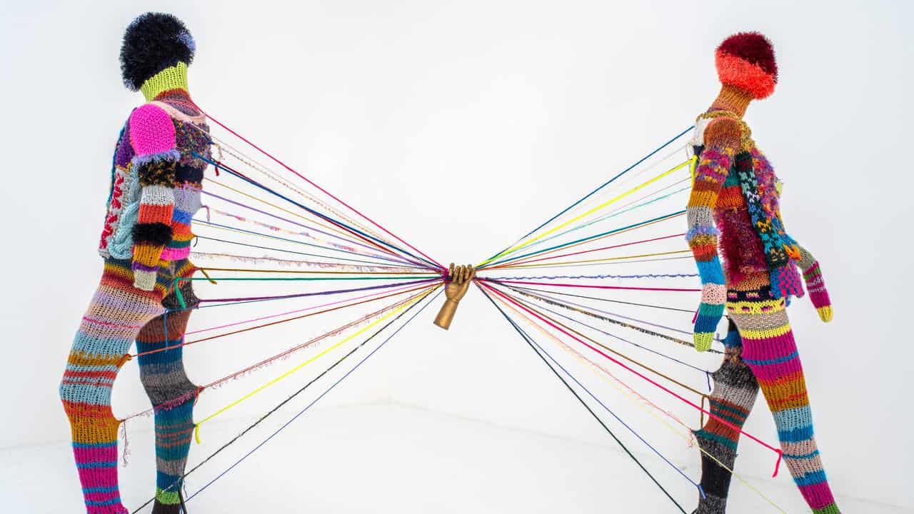 Yarn sculpture shows ties that bind in HIV science art