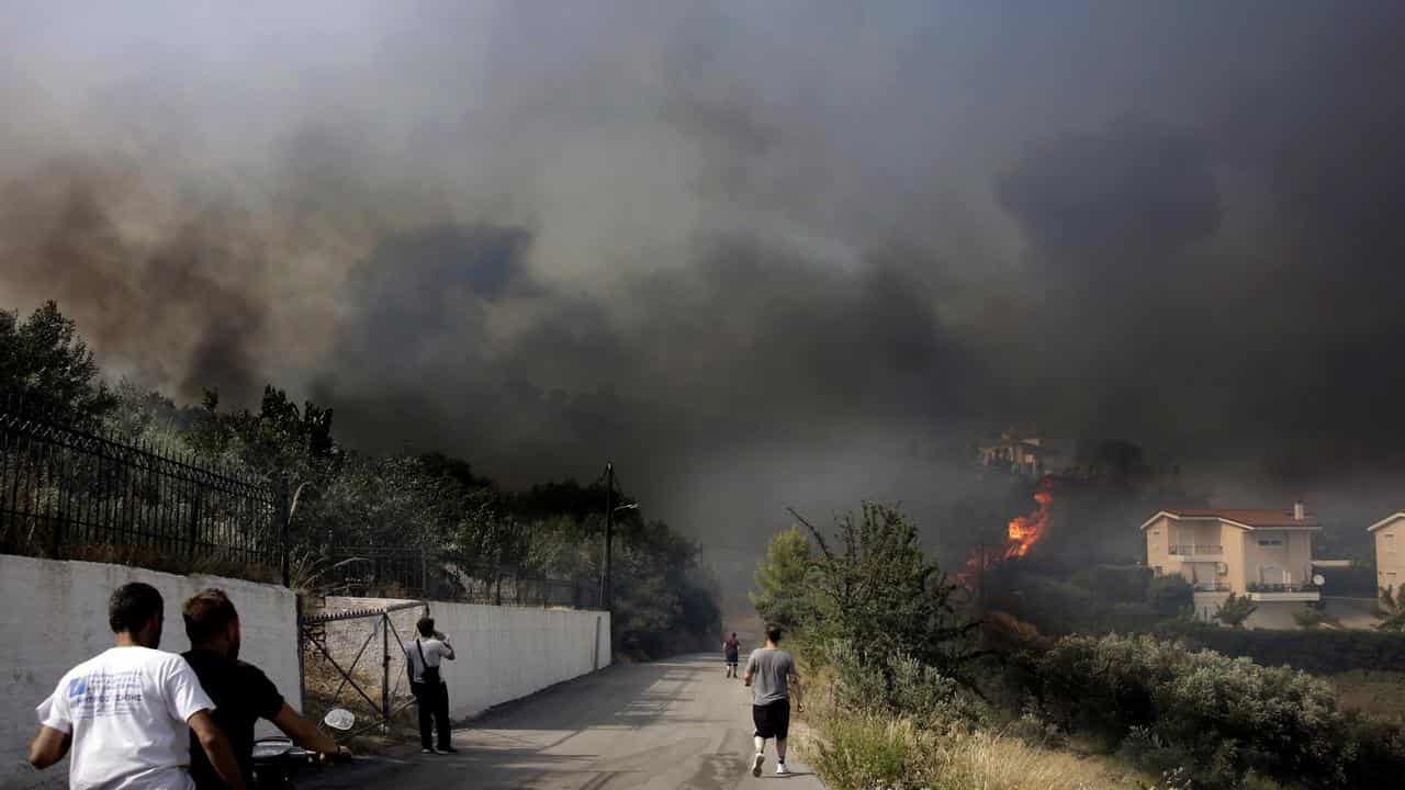 Greece PM says climate change 'not an excuse' on fires