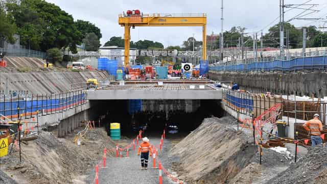 Workers return to cross-river rail after dangerous fall