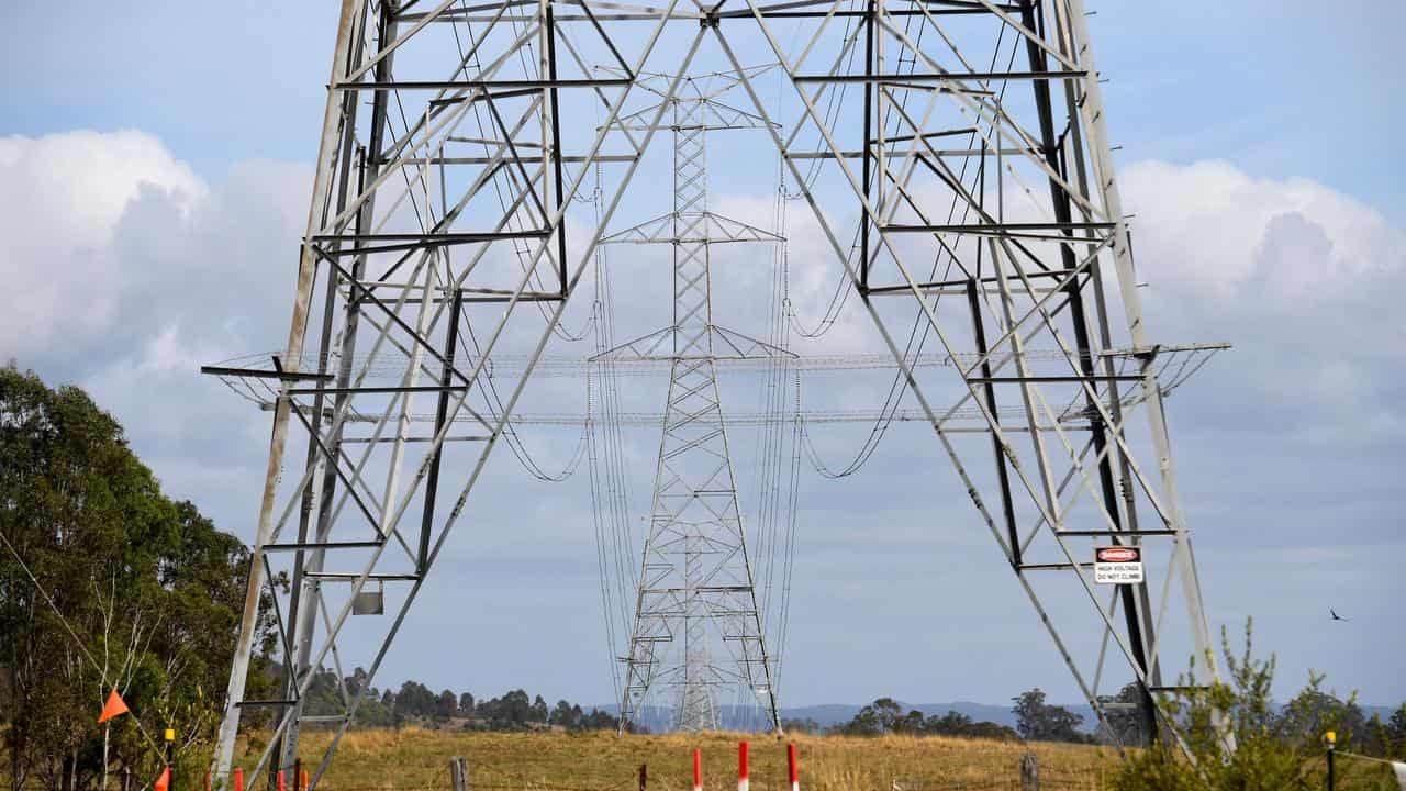 Sparks fly over planned power lines across farming land