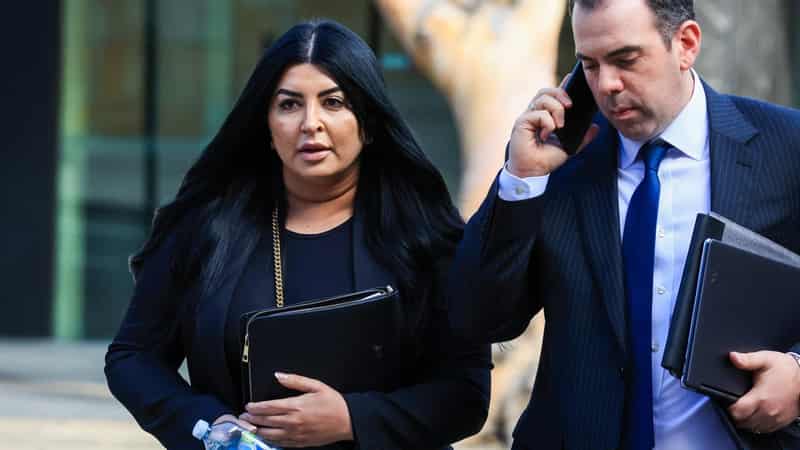 Lawyer accused of hiding her husband's link to murder