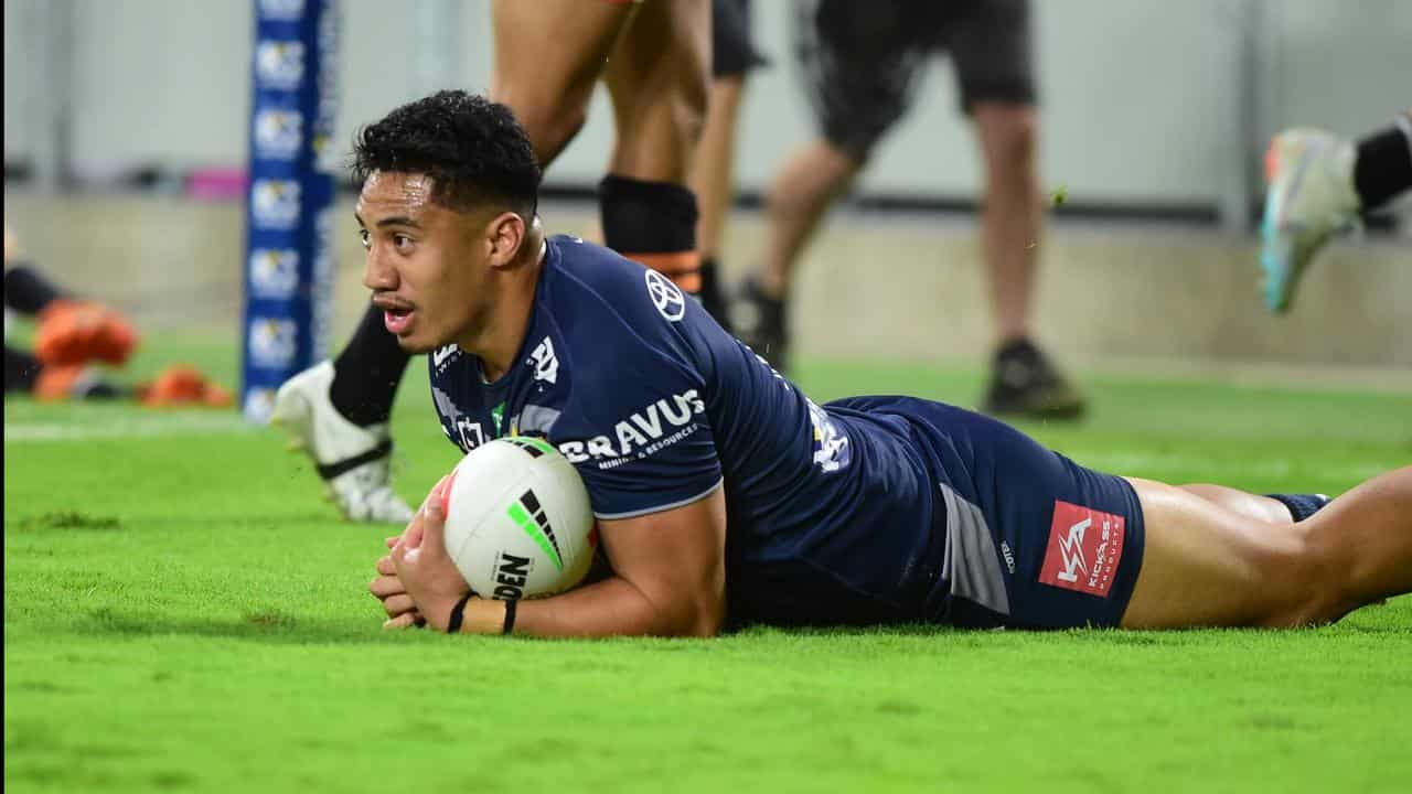 Taulagi trains in Holmes' left centre spot for Cowboys