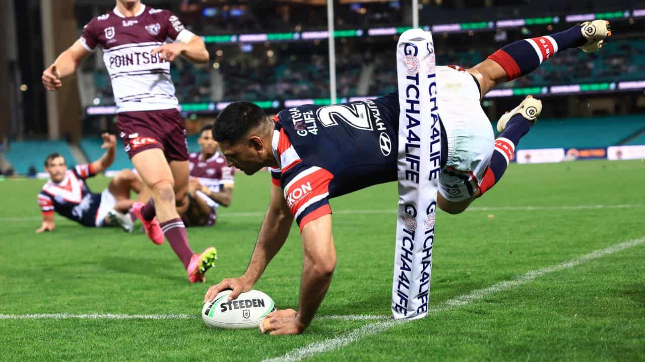 12-man Roosters claim vital NRL win over Manly