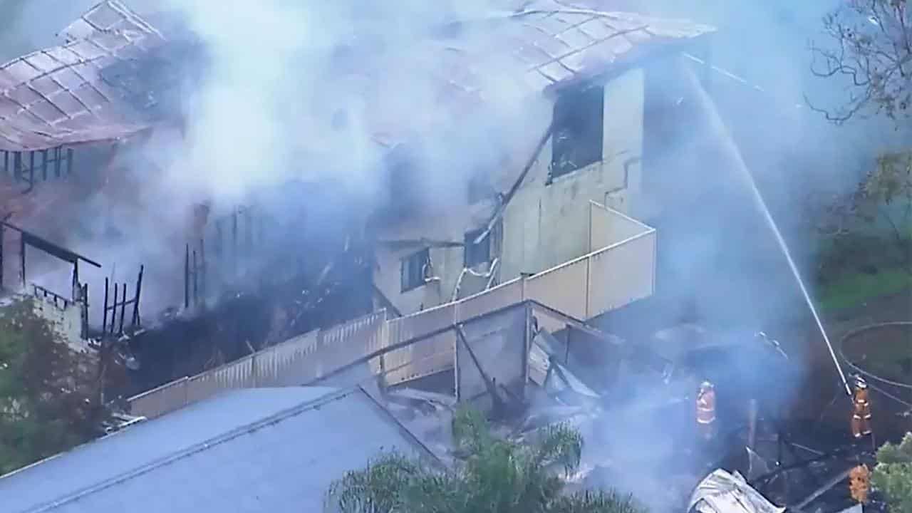 Queensland fire: bodies of five children, father found