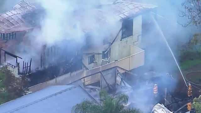 Queensland fire: bodies of five children, father found