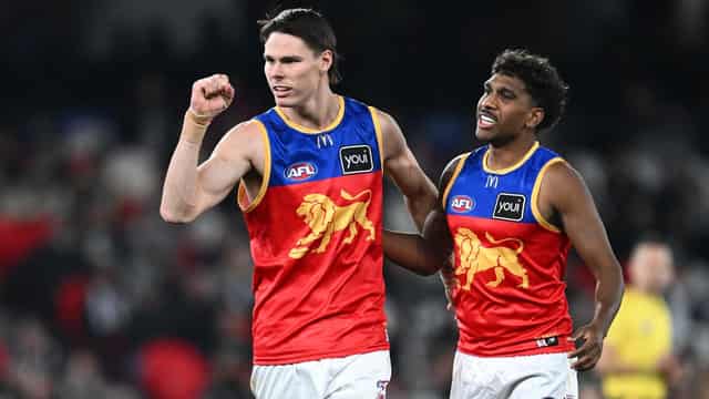 Lions survive Magpies challenge for crucial AFL win