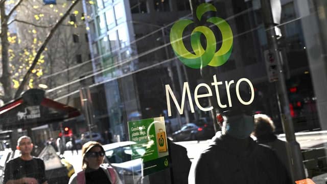 Woolworths says cautious customers are cutting back