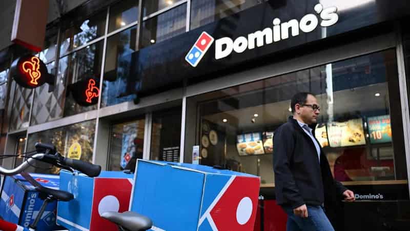 Domino's profit sliced 74 per cent as inflation bites