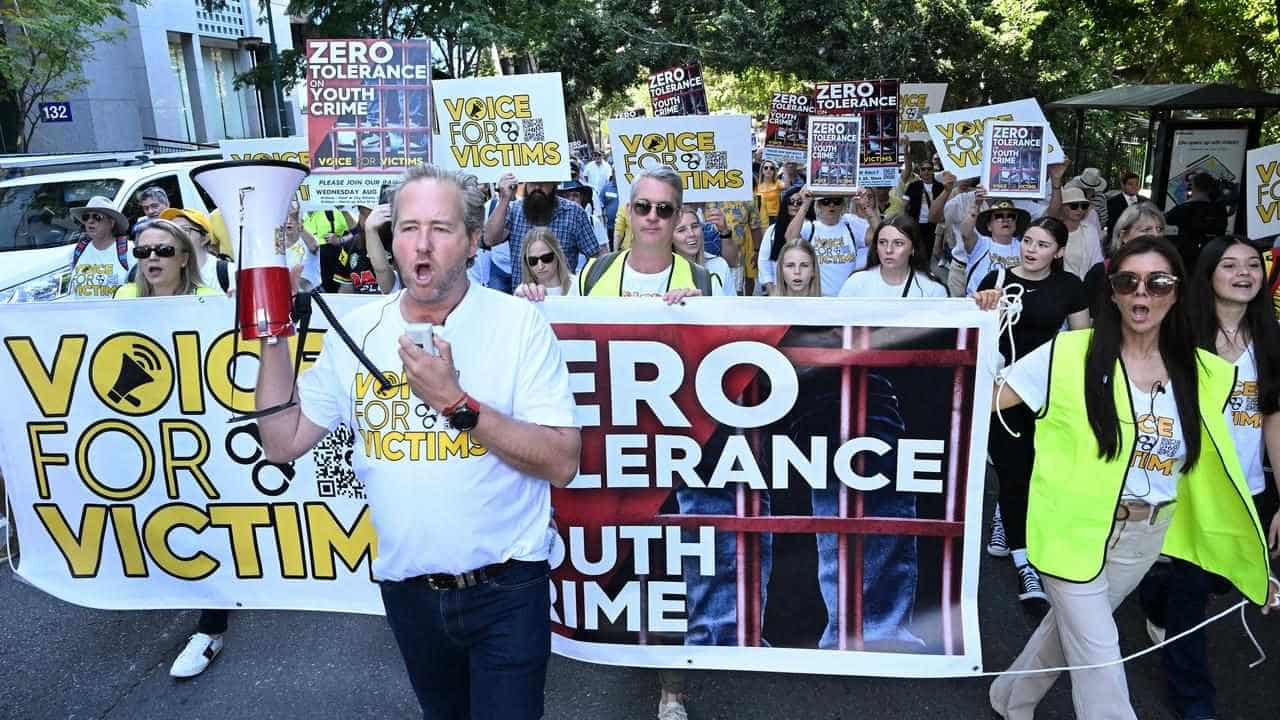 Frustrated youth crime victims march on Qld parliament