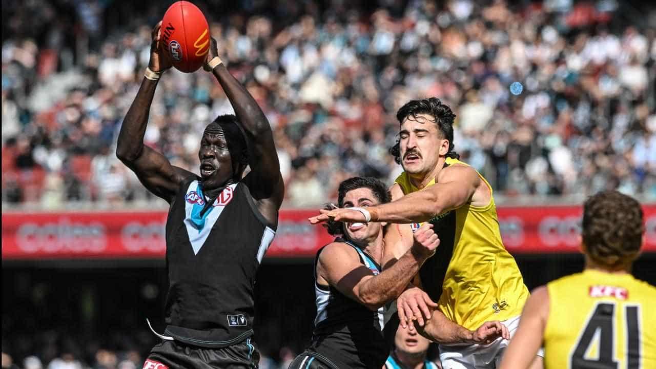 Port sink Richmond to secure third spot on AFL ladder