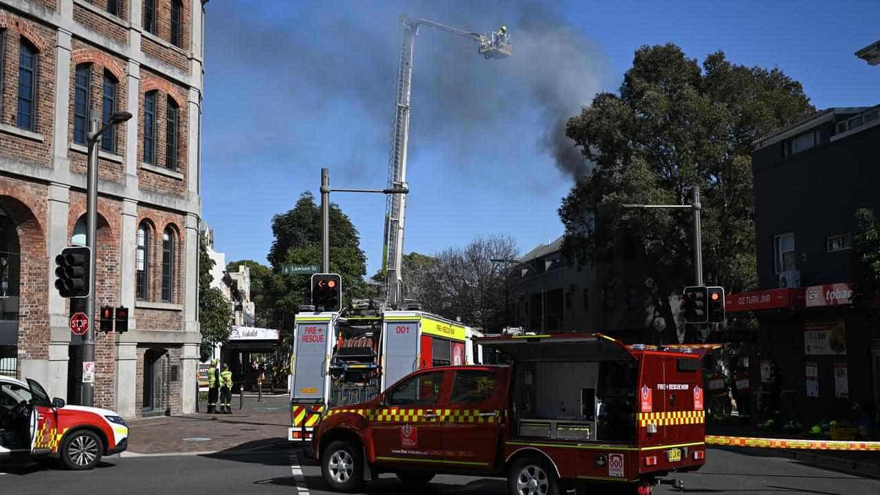 Man's body found after blaze rips through apartment