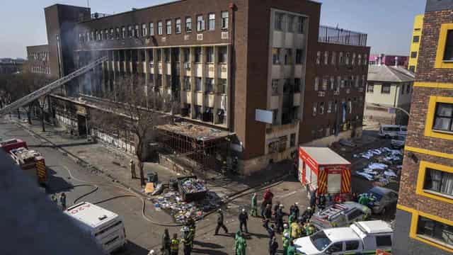 Dozens dead as fire guts South African apartment block