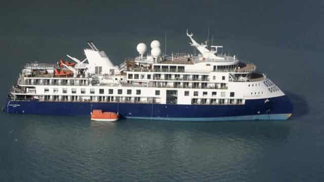 Luxury cruise ship remains stuck aground in Greenland