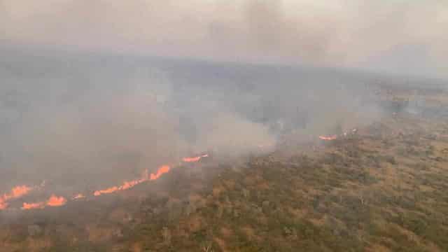 NT mega fire under control, but crews remain on alert