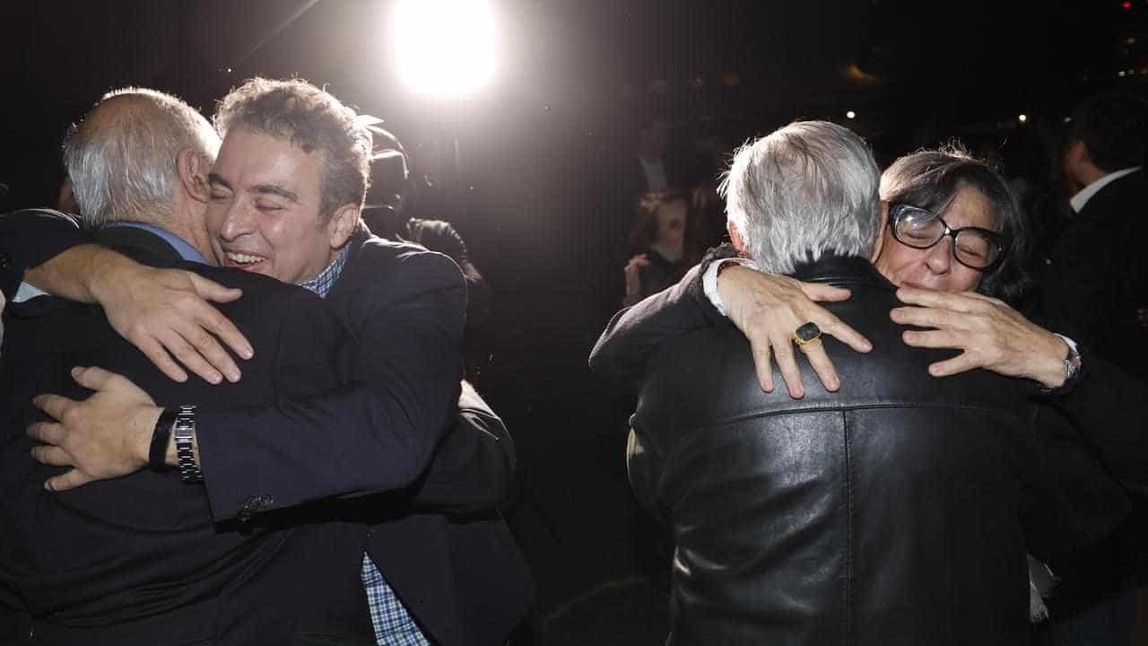 US prisoners freed from Iran make emotional return home