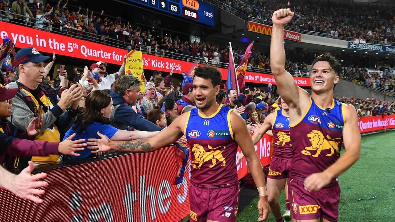 Lions survive Blues blitz to book AFL grand final berth