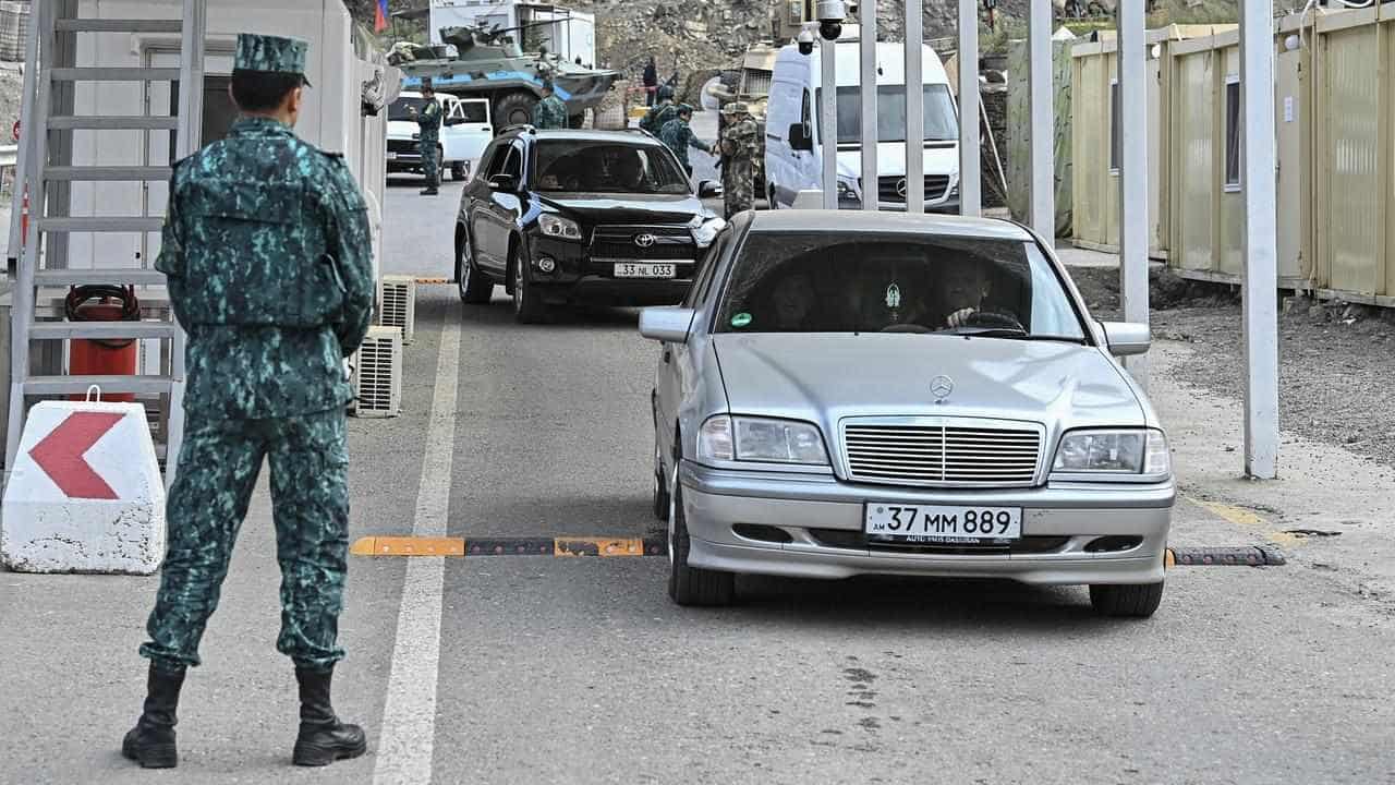 Ethnic Armenians flee Karabakh after region's defeat